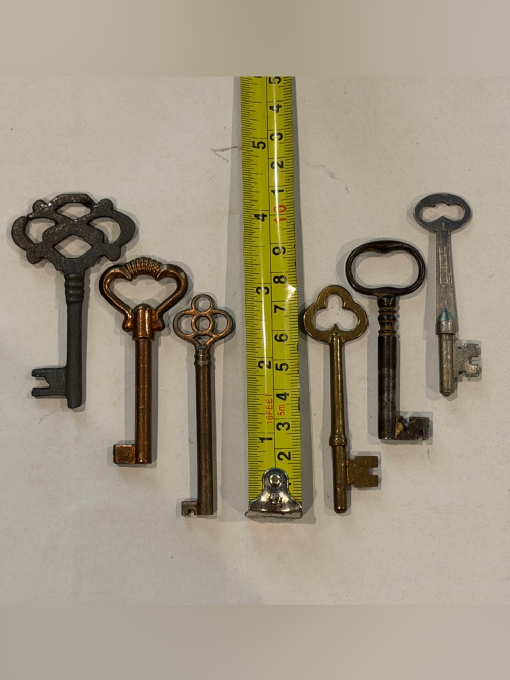 6 Silver, copper and black Vintage Metal Skeleton Keys